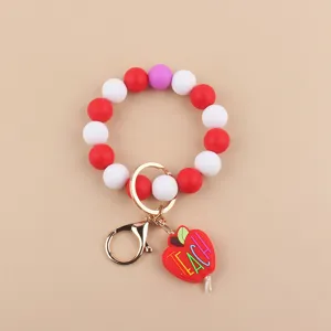 Llavero de cuentas de silicona con colgante manzana de maestro, anillo de pulsera.