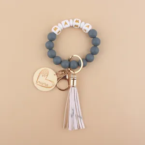 Silikon Perlen Armband Schlüsselanhänger mit MAMA Buchstaben Anhänger und Quaste.
