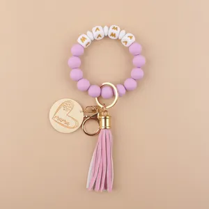 Silikon Perlen Armband Schlüsselanhänger mit Holz Herz Anhänger und Quaste für Muttertag.