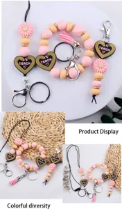 Ensemble créatif de porte-clés et breloques de sac en perles de silicone avec pendentif.