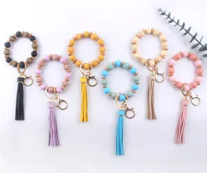 Llavero de pulsera con cuentas de silicona coloridas y borla de cuero PU, accesorio DIY.