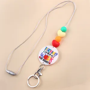 Cordón de profesor llavero de cuentas de silicona con un bonito colgante estampado.