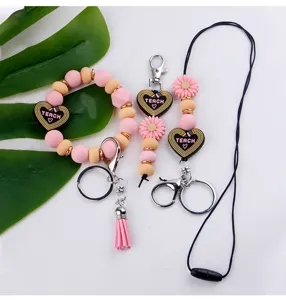 Ensemble de porte-clés en perles de silicone colorées avec marguerites et cœurs mignons.