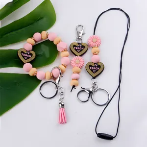 Ensemble porte-clés perles silicone avec jolies marguerites et pendentifs cœur pour sac