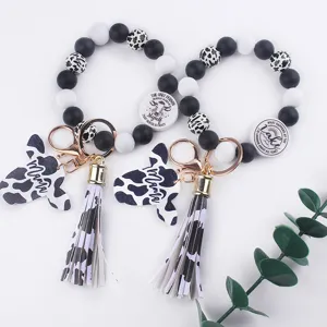 Cartoon Western cow head keychain silicone bead wristlet strap with long tassel charm
