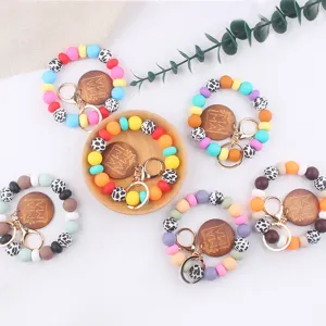 Kleurrijke siliconen kraal sleutelhanger met gegraveerde MAMA houten bedel armband set