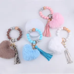 Silikon Perlen Armband Schlüsselanhänger mit flauschigem Herz Anhänger und PU Quaste.