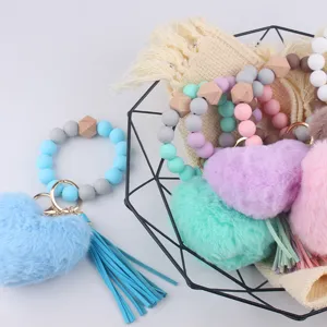 Silikonperlen Armband Schlüsselanhänger mit Plüschherz Anhänger und PU Leder Quaste.