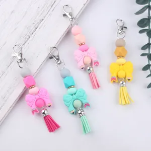 Schleife Silikon Perlen Schlüsselanhänger Mit PU Quaste Süße Armband Tasche Anhänger Für Damen Schlüssel Zubehör
