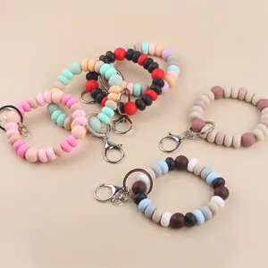 Silicone beaded wristlet keychain with metal clasp, colorful bracelet key ring accessories.