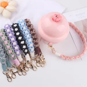 Handmade woven cup strap with cute flower patterns, perfect for Stanley water bottles and daily use.