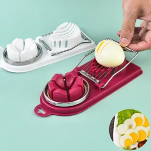 Dettaglio tagliauova professionale con modalità di taglio precise per fette e petali