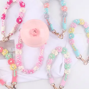 Handmade crochet daisy pearl water bottle strap, colorful woven cup rope detailed view.