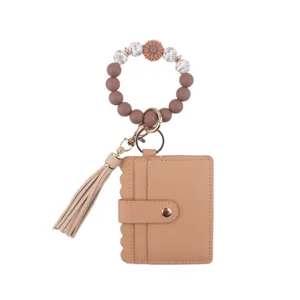 Silicone beaded wristlet card holder keychain with tassel, stylish wallet for daily use.