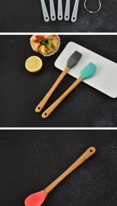 Detailed view of mini silicone baking tools with bamboo handles featuring a brush and spatula