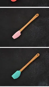 Detail showing mini silicone spatulas in pink and cyan with ergonomic wooden handles.