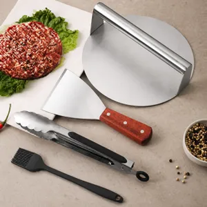 Vue détaillée de l'ensemble de presse à burger en acier inoxydable avec spatule et pince.