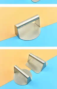 Stainless steel meat press detail, durable burger press tool for outdoor BBQ grilling.