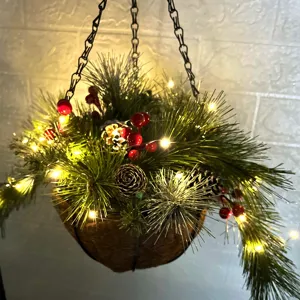 Christmas hanging basket wreath with pinecones, red berries and LED lights for holiday home decor.