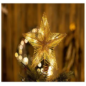 Beleuchteter goldener Glitzer Stern Baumspitze aus Eisen mit LED Weihnachtsbaum Deko Detail.