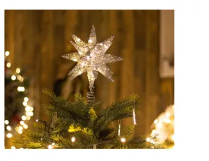 LED Weihnachtsbaum Stern Spitze Nahaufnahme, leuchtender Eisenstern Feiertagsdeko.