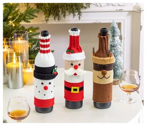 Christmas knitted wine bottle cover set, cute snowman and Santa design for holiday dinner decor.