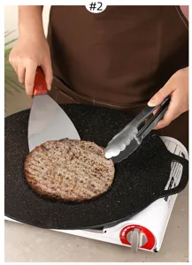 Detailed view of stainless steel burger press spatula and tongs in use for cooking patties.