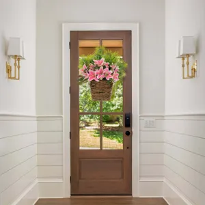 Spring pink lily hanging flower basket wreath detail for front door porch home decor scene view.