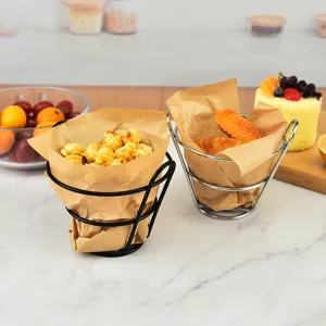 Conical iron wire snack basket for fries and fried chicken, perfect for bar and restaurant use.