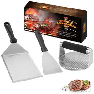 Stainless steel BBQ grill tool set with heavy duty burger press and spatulas for outdoor cooking.