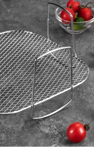 Stainless steel air fryer rack detail view, perfect for baking, steaming, and food dehydration.