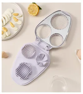 Multifunctional egg slicer kitchen tool, detailed view showing stainless steel cutting grids.