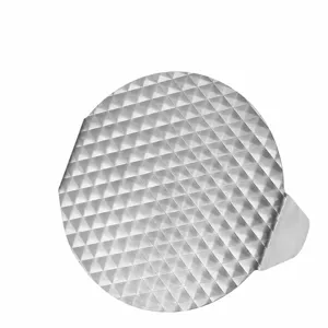 Round stainless steel burger press for kitchen cooking, durable meat patty maker tool for grill.