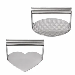 Stainless steel burger press set, round and heart-shaped meat patty maker for kitchen cooking.