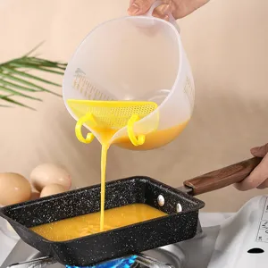 Japanese style scale egg mixing bowl with filter mesh for kitchen baking and cooking use.