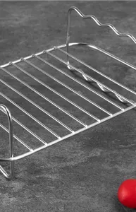 Stainless steel double layer steam rack detail shot for air fryer and kitchen baking.