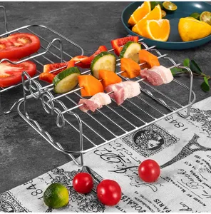 Stainless steel double layer air fryer rack with skewers for roasting kitchen detail.