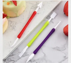 Detail view of colorful dual-ended fondant carving tools for cake decorating and DIY baking.