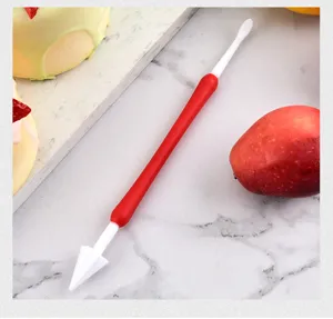 Close-up detail of double-ended fondant carving shaping tool for baking and DIY crafts.