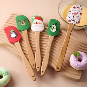 Christmas silicone spatula set with wooden handles, cute holiday baking tools for cake and cream.