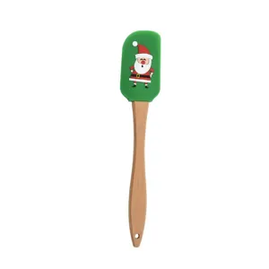 Christmas silicone spatula with wooden handle for baking cakes, cream and fruit jam.