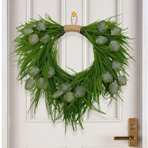 Detailed view of artificial pine and eucalyptus wreath, perfect for spring door or fireplace decor.