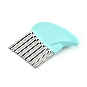 Stainless steel crinkle cutter with blue handle for cutting potatoes and vegetables easily.