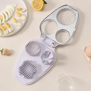 Multi-functional egg slicer kitchen tool with stainless steel wire for boiled eggs and fruit.