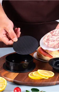 Plastic burger press detail showing the mold plate and meat patty preparation process.
