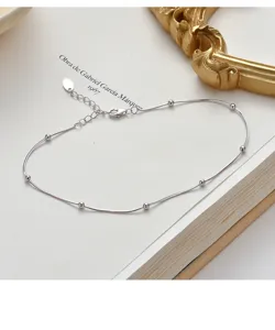 S925 sterling silver snake bone chain anklet with sparkling beads, elegant foot jewelry for women.