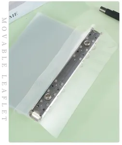Clear PVC loose leaf binder divider with metal ring mechanism for custom stationery planning.