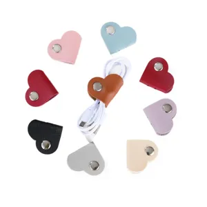 Avvolgicavo in ecopelle PU a forma di cuore organizzatore per cuffie colorato portatile
