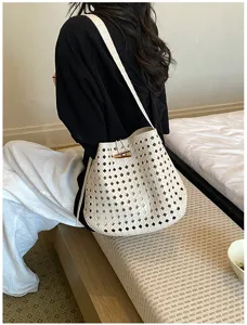 Stijlvolle hol geweven emmertas voor dames, retro schoudertas voor dagelijks gebruik en vakantie.