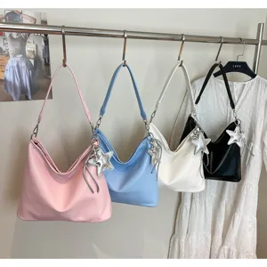 Chic niche design tote bag, casual PU leather shoulder handbag with star charm for women.